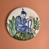 Tableau femme assise aux fleurs